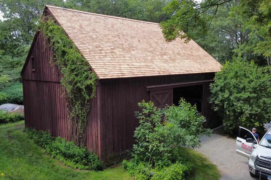 barn with new roof shingles